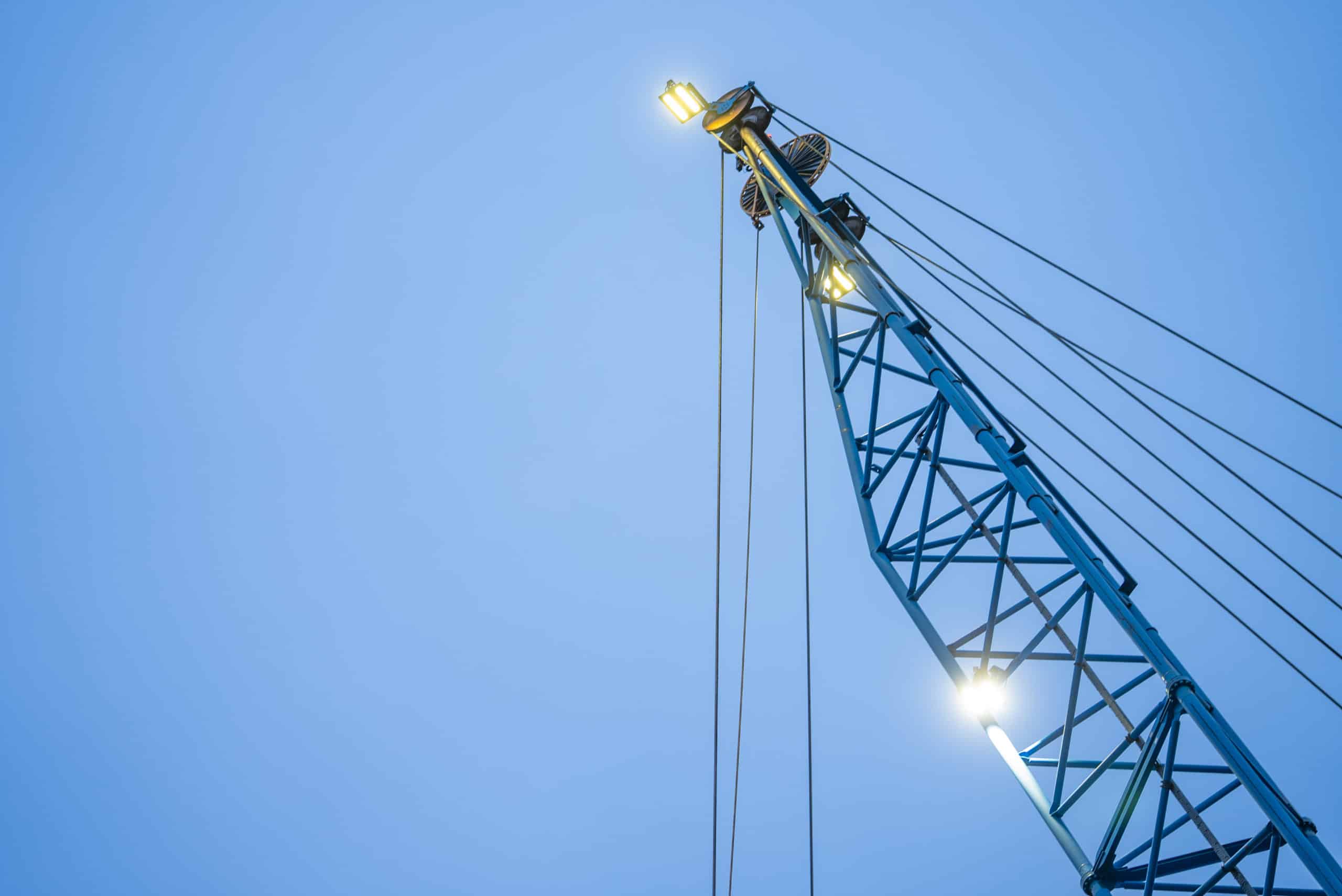 Industrial blue crane with lights