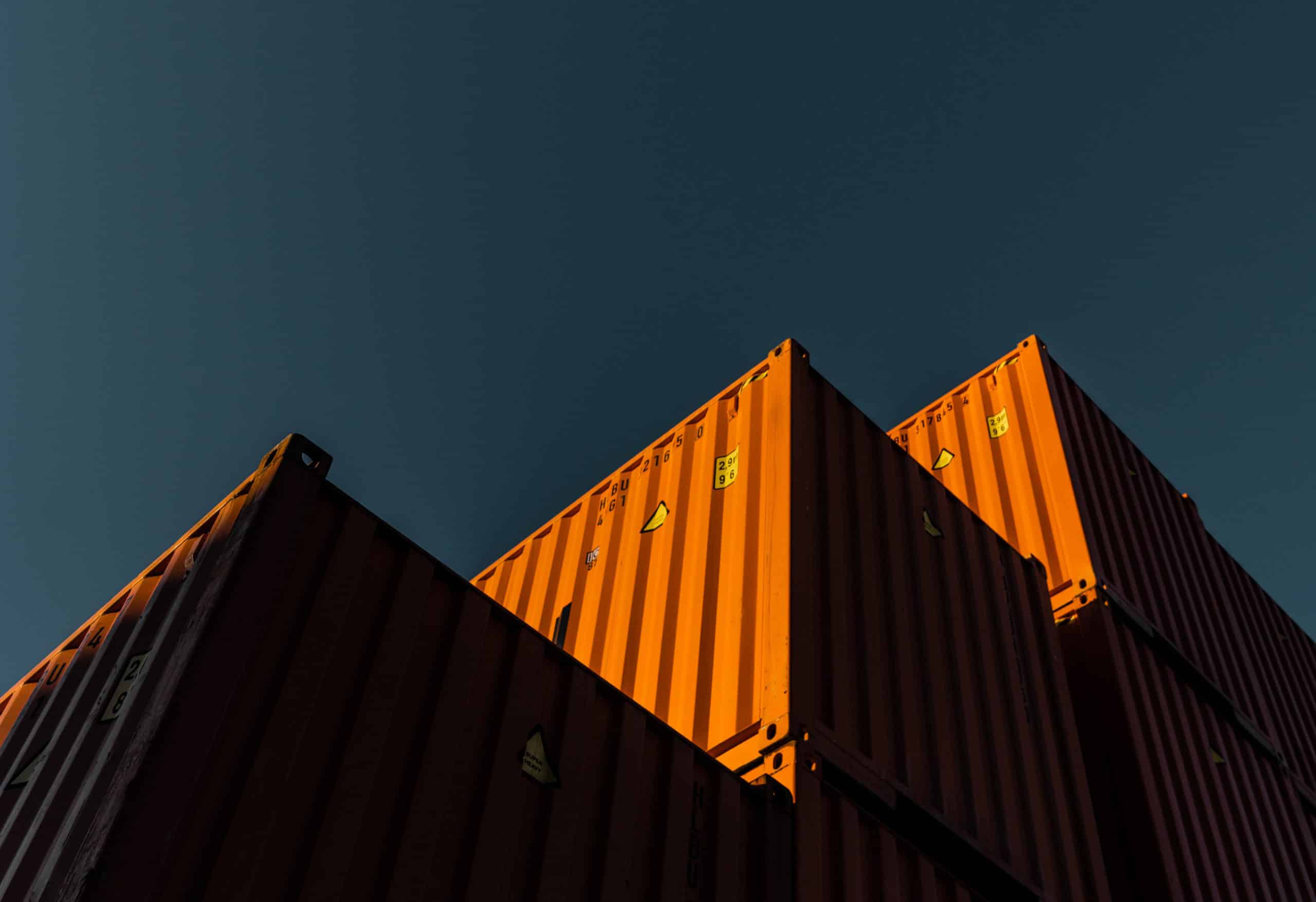 Orange containers stacked.